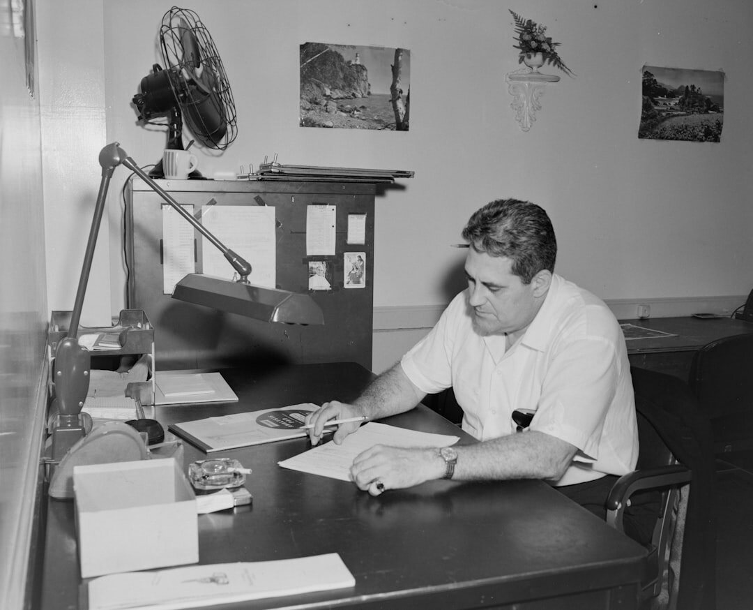 author writing at desk